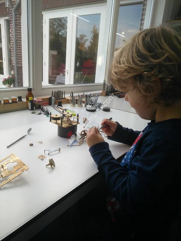 De uurwerkhersteller