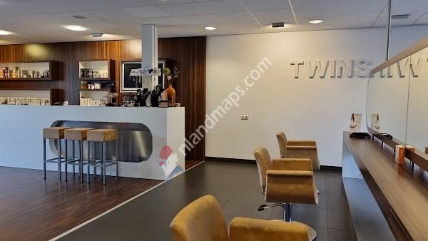 Twins sisters in hair